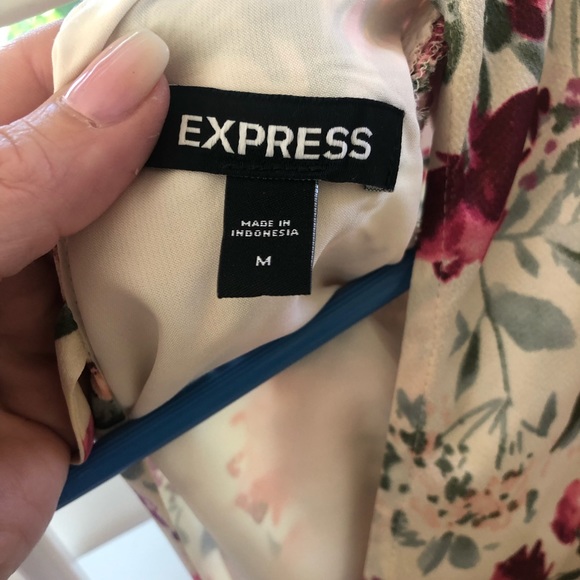Express floral faux wrap tie back peplum top. - Picture 4 of 6